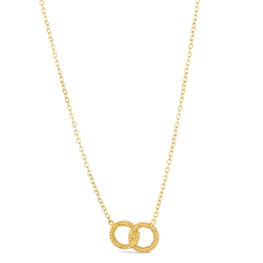 18k yellow gold necklace featuring two interlocking diamond-cut textured circles on a delicate chain.