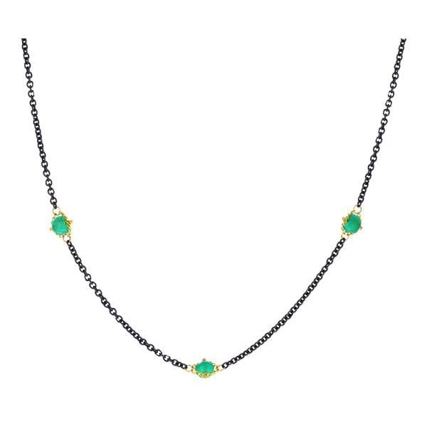Oxidized silver chain necklace featuring three emeralds set in delicate handwoven 18k yellow gold accents.