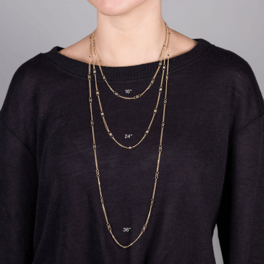 Amali 18k yellow gold chain necklace featuring hand-woven emerald stones, shown in 16, 24, and 36-inch lengths.