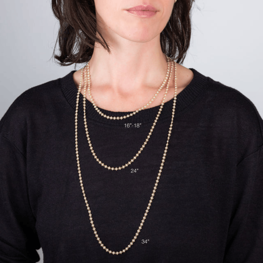 Gray diamond necklace hand-woven with 18k yellow gold chain, shown in 16-18, 24, and 34-inch lengths on a model.