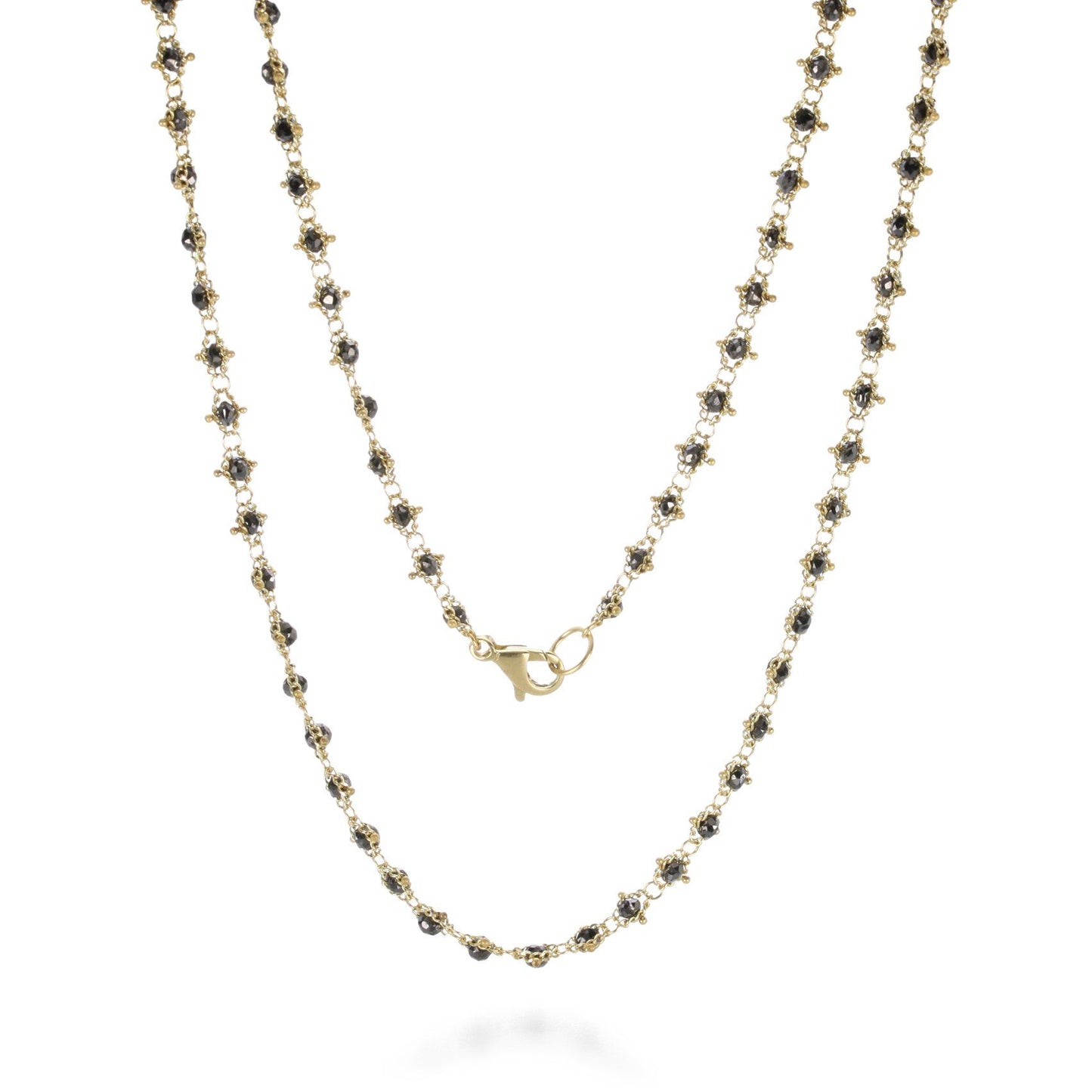 Gray diamond beads hand-woven into an 18k yellow gold chain necklace with a lobster clasp closure.