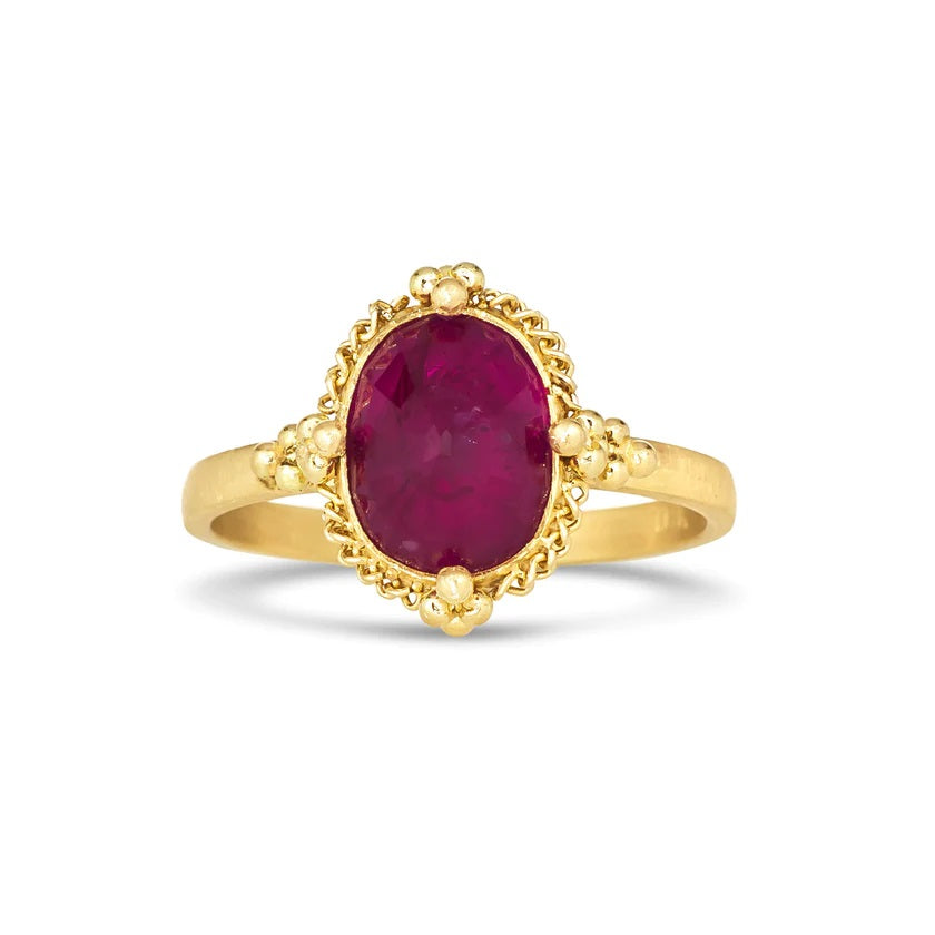One-of-a-kind 18k yellow gold ring featuring a 3.55ct oval faceted ruby with intricate beaded and twisted wire detail.