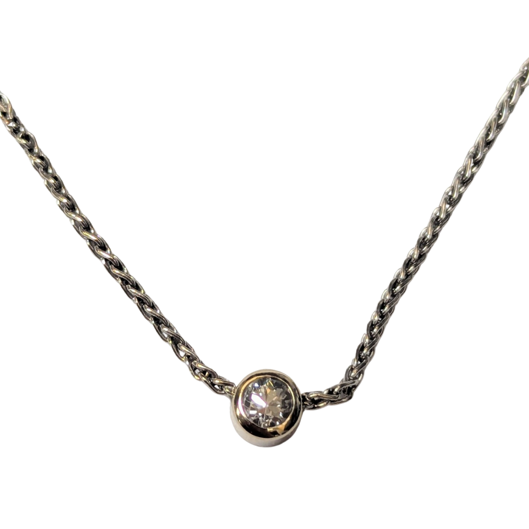 14k white gold chain necklace featuring a bezel-set Old European cut diamond pendant.