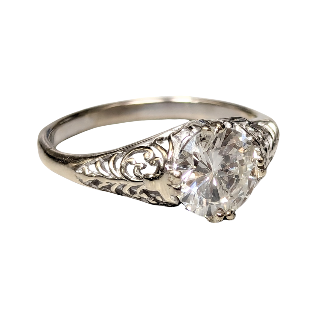 1.36 carat round diamond ring in 14k white gold with an intricate Art Deco filigree shank.