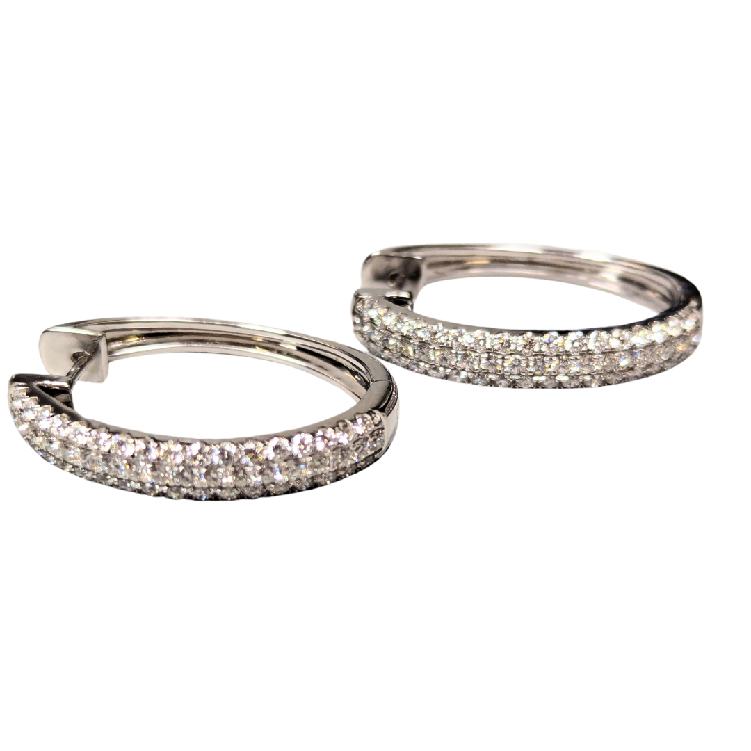 14k white gold hoop earrings featuring a pave setting with 2.08 carats of sparkling round diamonds.