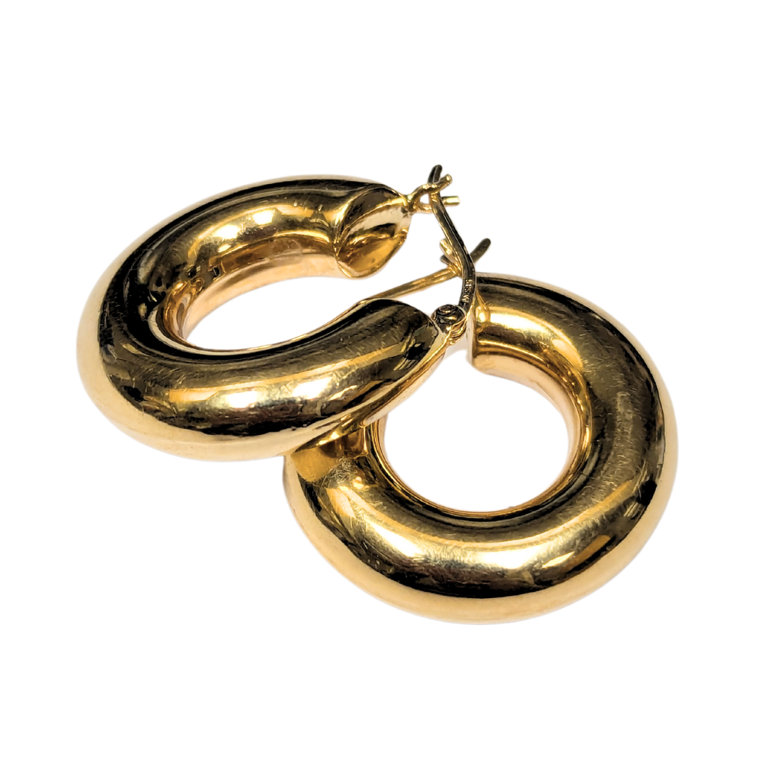 Polished 14k yellow gold chunky hoop earrings, 6.5mm wide with a thick, rounded design.