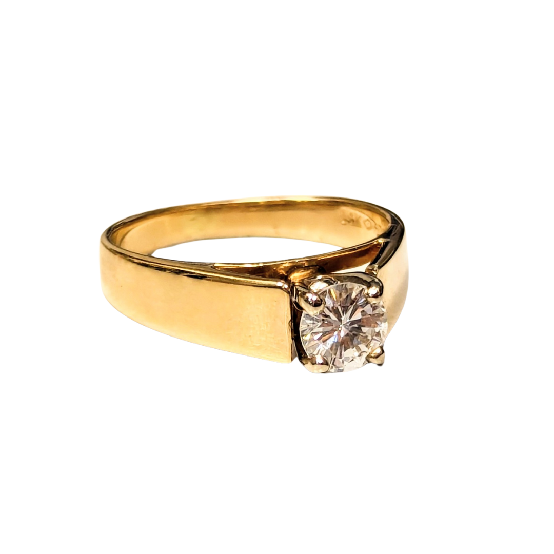 14k yellow gold cathedral solitaire engagement ring featuring a 0.47ct round brilliant cut diamond.