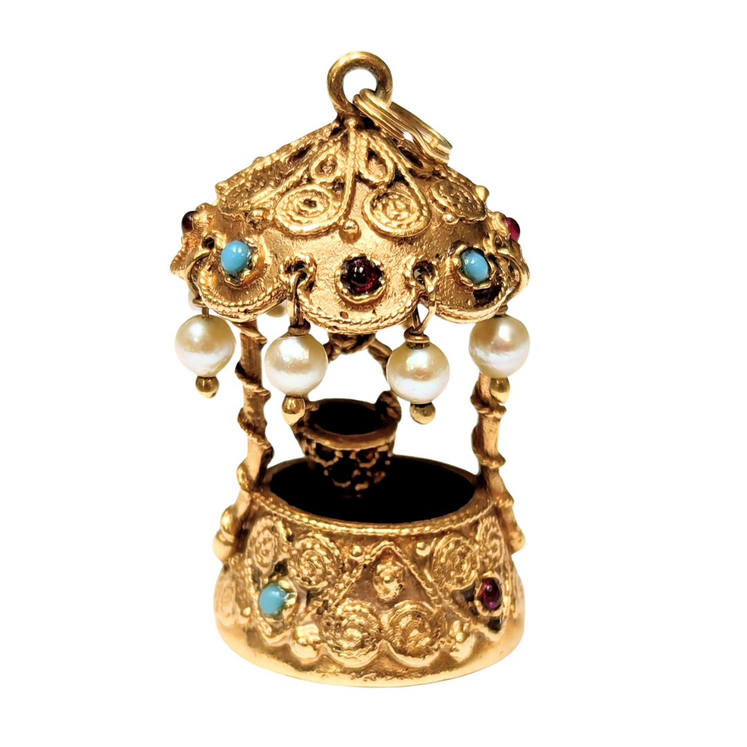 Mid-century 14k yellow gold wishing well charm with cultured pearls and colorful red and blue glass cabochon accents.