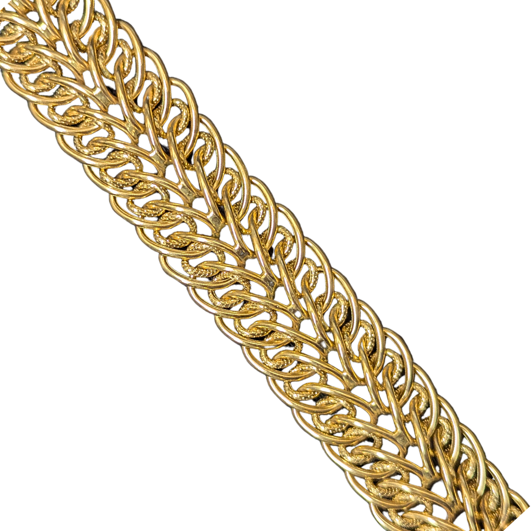 14k yellow gold 18mm wide Sedusa link bracelet with polished and etched textures.