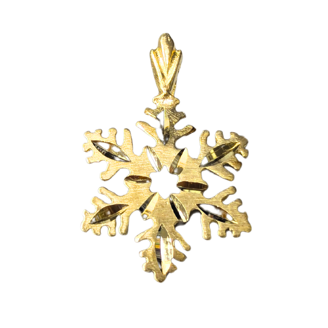 14k yellow gold snowflake pendant with intricate diamond-cut detailing and a polished bail on a white background.