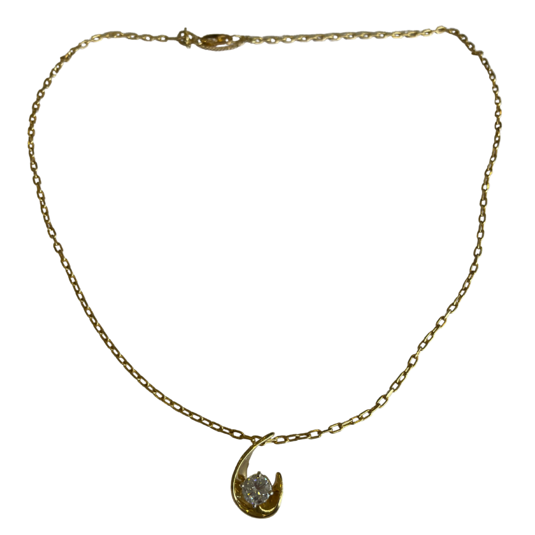 0.73 carat round diamond pendant in 18k yellow gold on a 17-inch cable chain with extender.