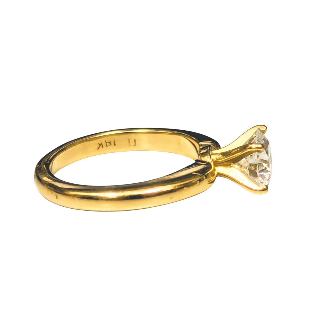 18k yellow gold solitaire engagement ring with a 1.03 carat round brilliant cut diamond, size 5.