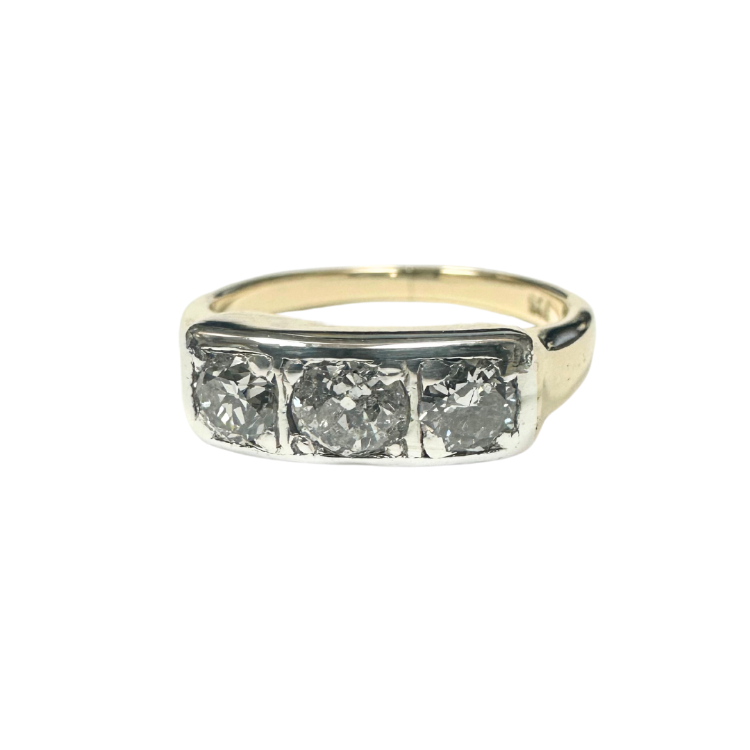Vintage 3-stone ring featuring 0.50ct old European cut diamonds set in 14k yellow gold and sterling silver.