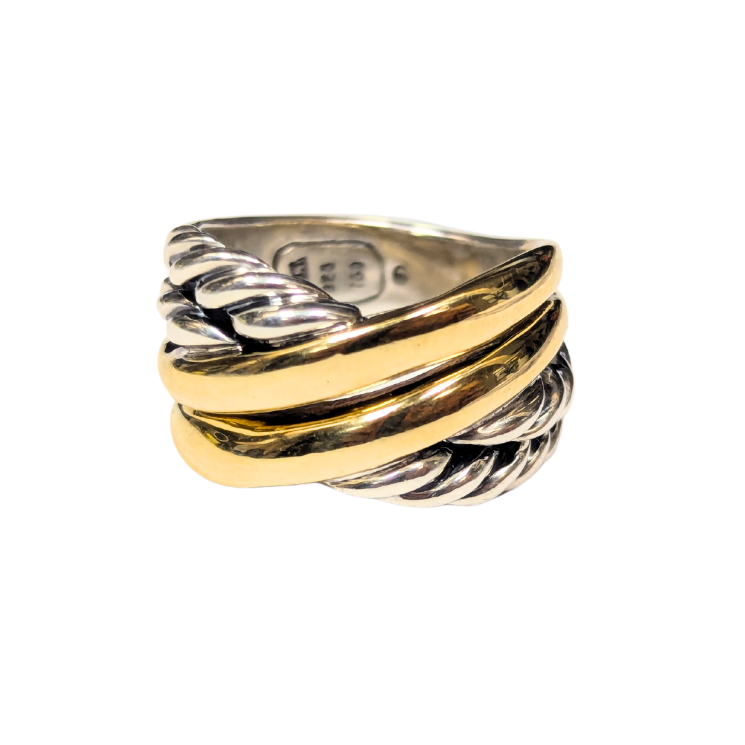 David Yurman crossover band ring in sterling silver and 18k yellow gold with twisted cable and smooth metal textures.