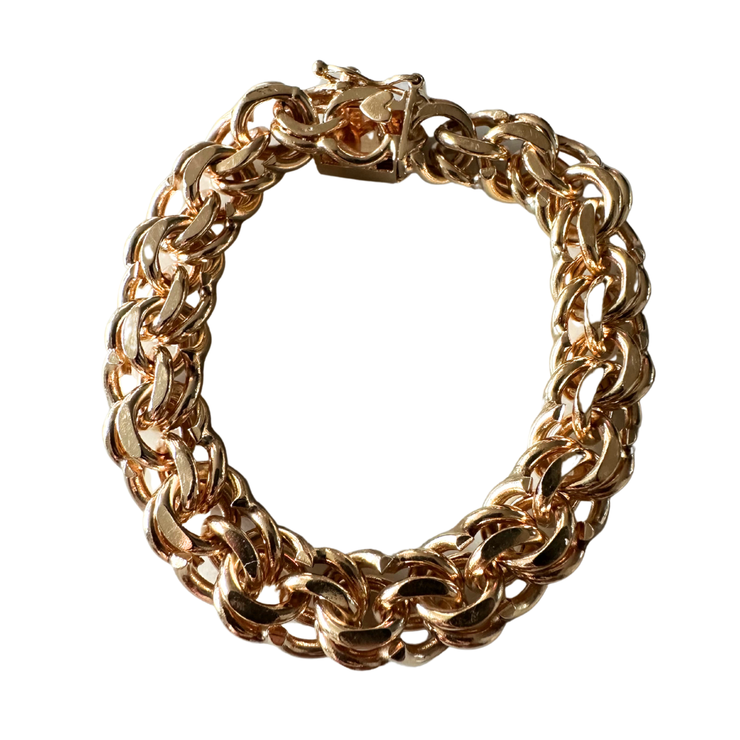 7-inch 14k yellow gold double link bracelet with a polished finish and secure box clasp.
