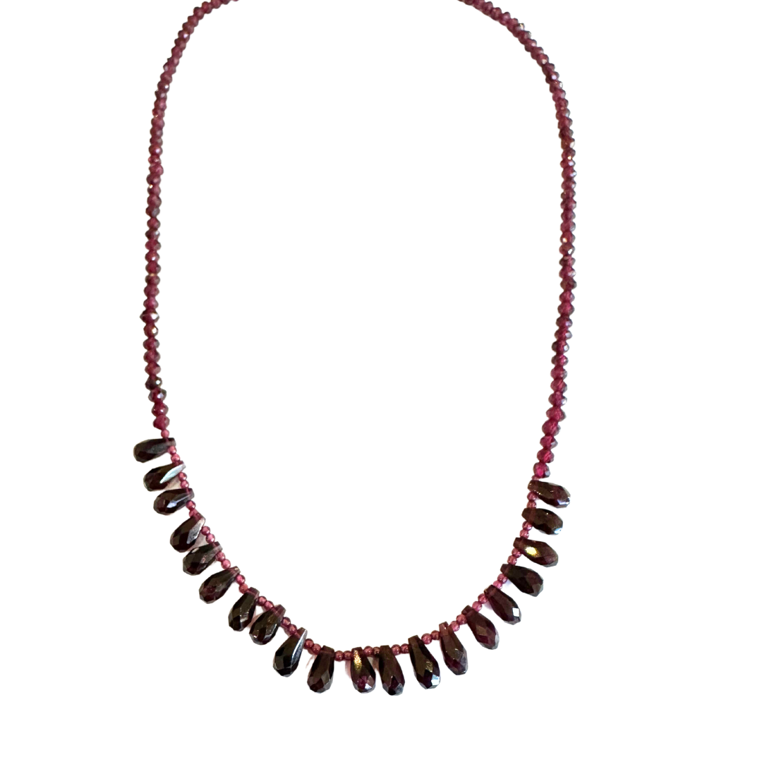18-inch garnet necklace featuring 3.7mm faceted beads and 20 deep red briolette-cut garnet drops.