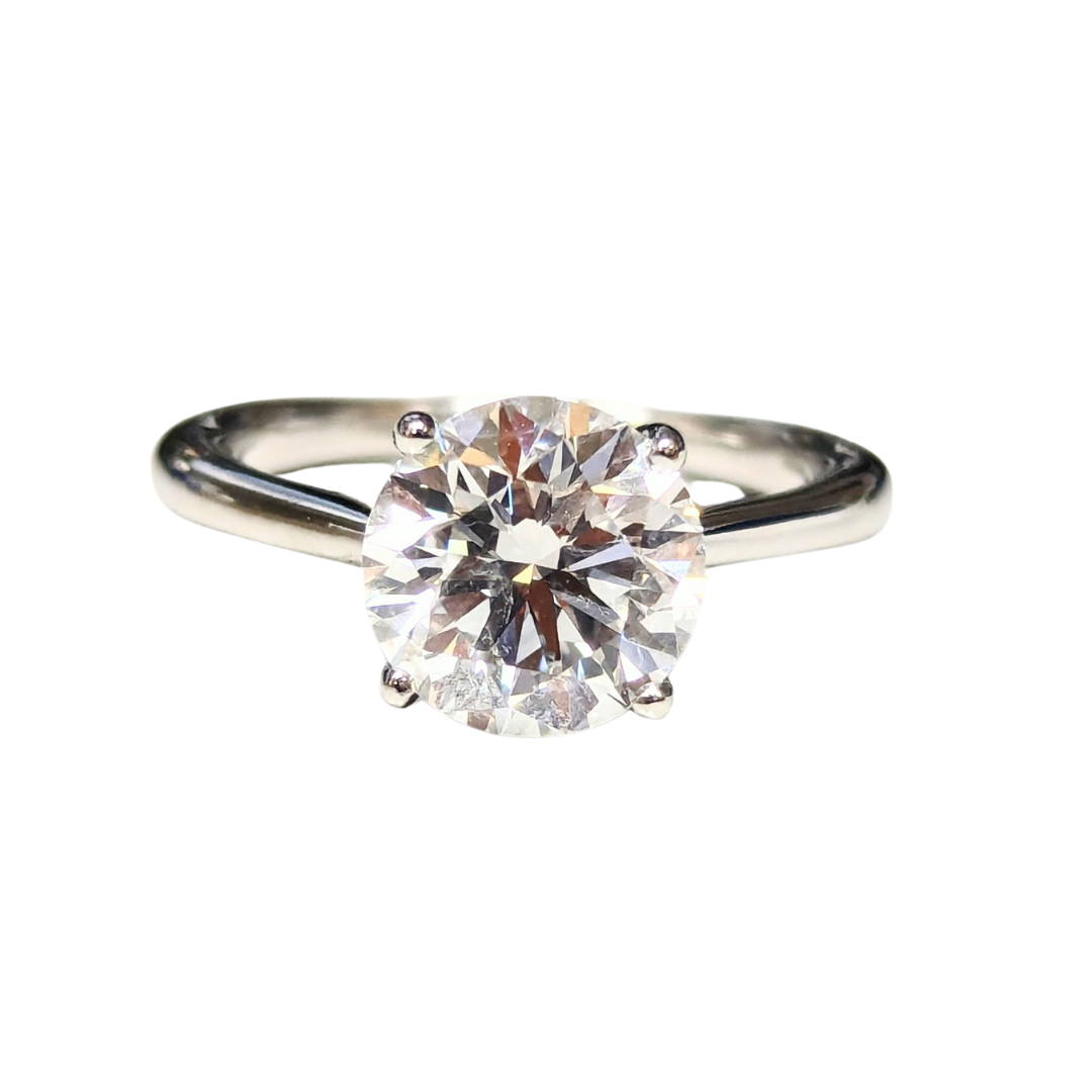 2.31 carat round brilliant cut diamond solitaire engagement ring set in polished platinum with a four-prong setting.