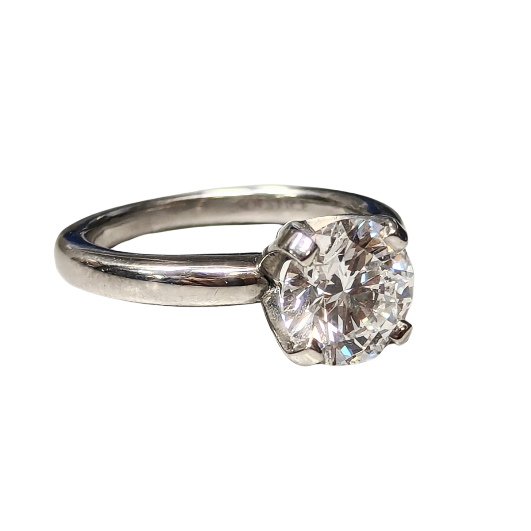2.03 carat round brilliant cut diamond solitaire ring set in polished platinum.