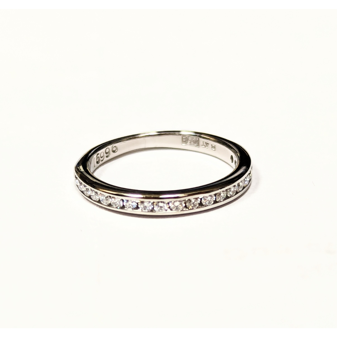Platinum channel-set anniversary band featuring 20 round brilliant-cut diamonds totaling 0.25ct on a size 4.5 ring.