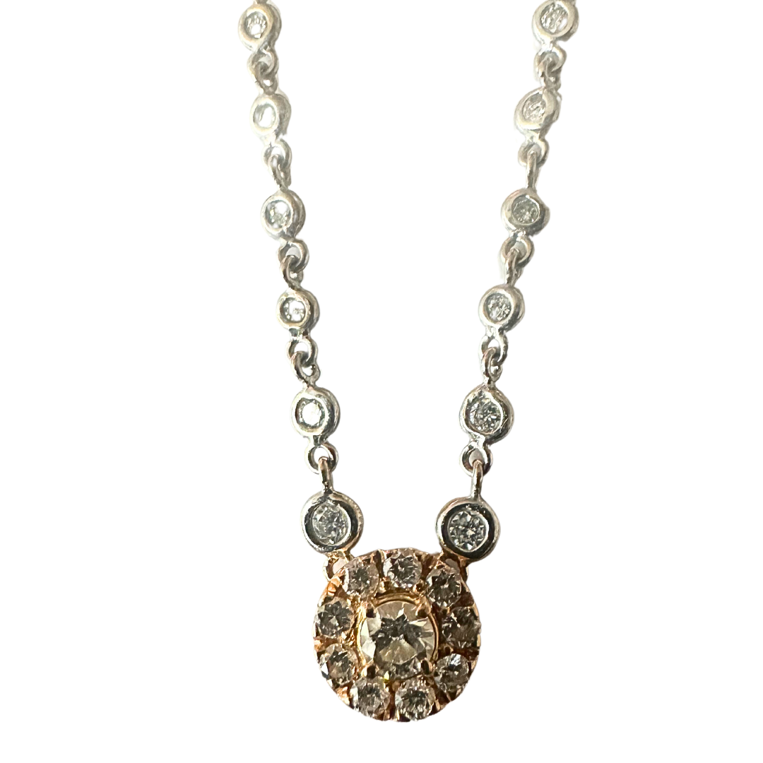 Staurino Fratelli necklace in 18k rose and white gold with a diamond cluster pendant and bezel-set diamond chain.