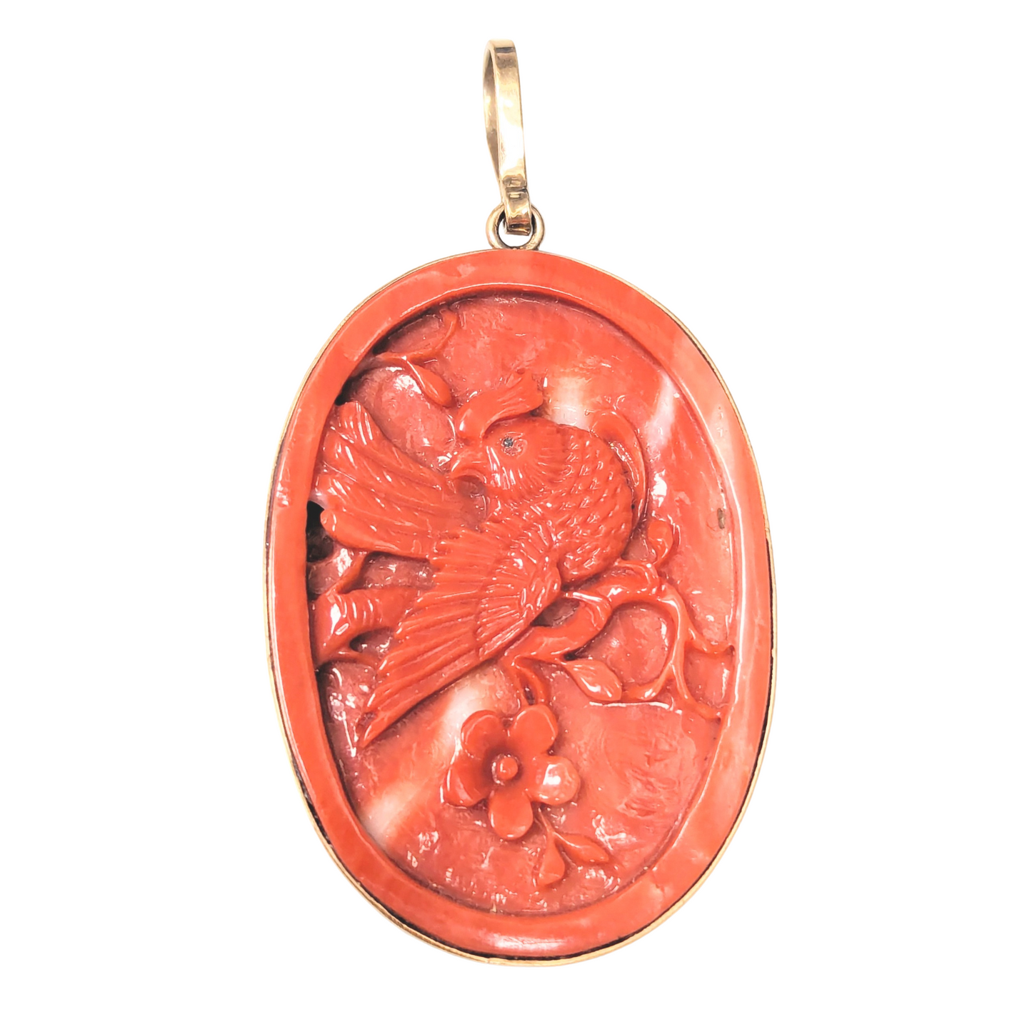 Vintage oval red coral cameo pendant featuring a carved rooster in a 14k yellow gold bezel setting.