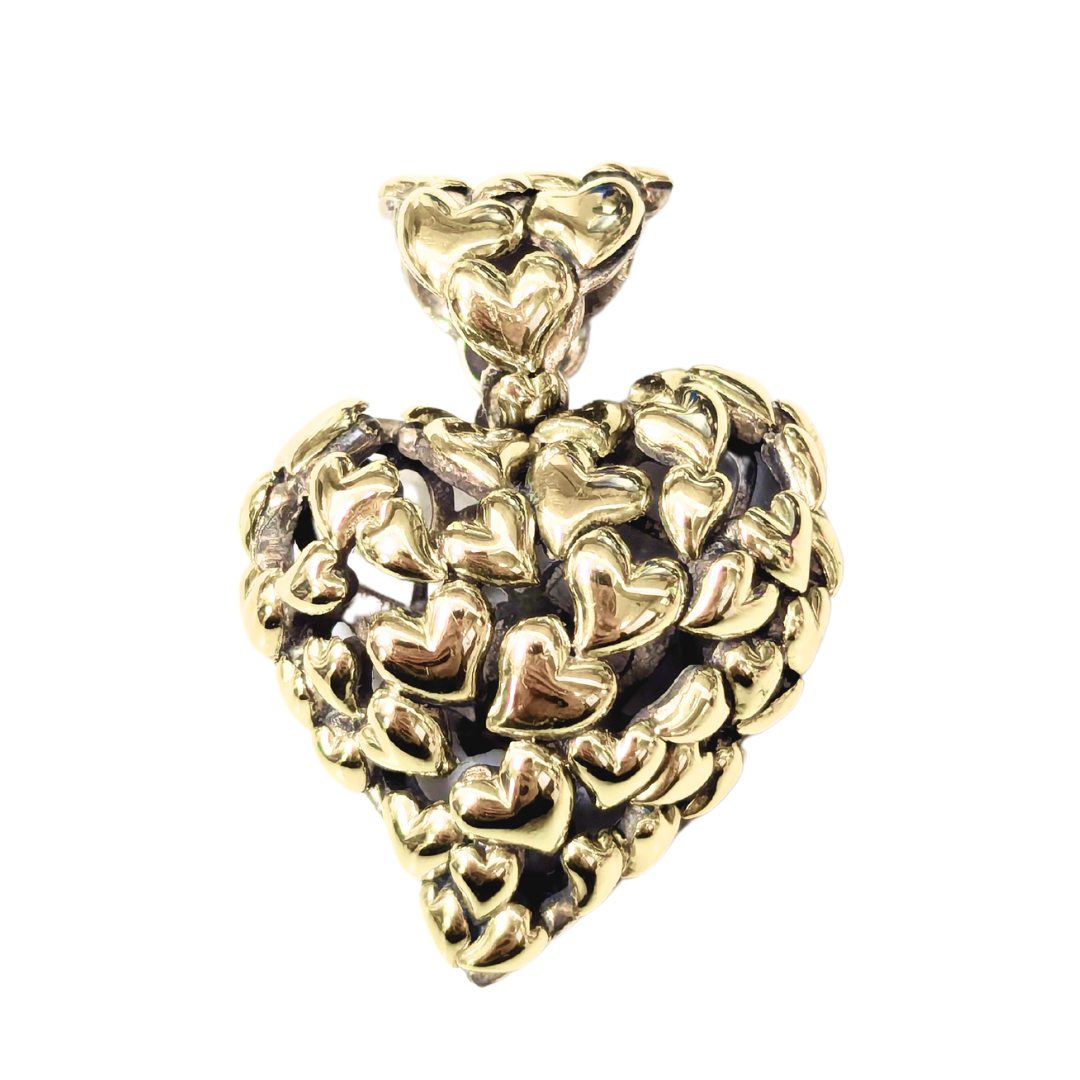 John Hardy heart pendant crafted in sterling silver and 18k yellow gold with a layered, textured heart-motif design.